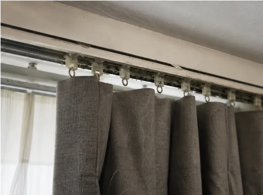 Older hotel drapery track and carriers needing service